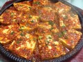 铁板豆腐是哪里的菜（铁板豆腐是哪里的菜系）