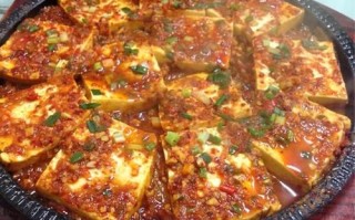 铁板豆腐是哪里的菜（铁板豆腐是哪里的菜系）