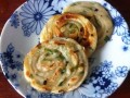 哪里蒜油饼（蒜香油饼是怎么做的）