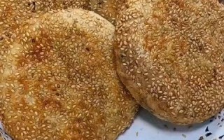 北京麻酱烧饼哪里最好,北京麻酱烧饼在哪里学的啊